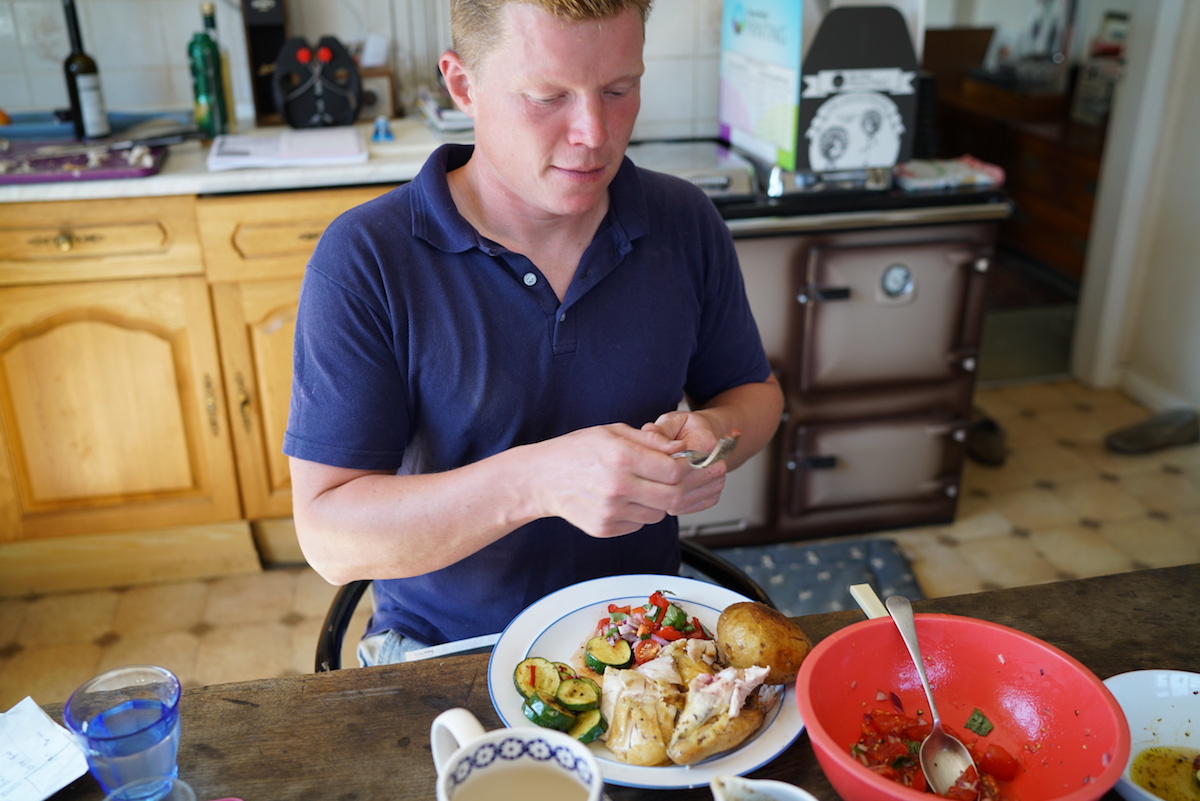 Jacob about to tuck into one a roast of slow grown chicken. Yum